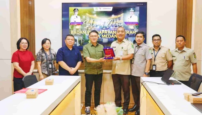 Bapenda Kota Medan Terima Kunjungan Studi Komparasi Bapenda Kota Manado Terkait Implementasi QRESTO